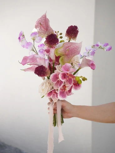 Blush pink and deep plum flowers in the Paige bouquet